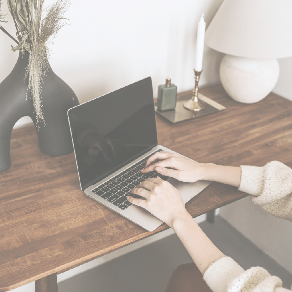 image of a woman at a computer desk, affiliate marketing